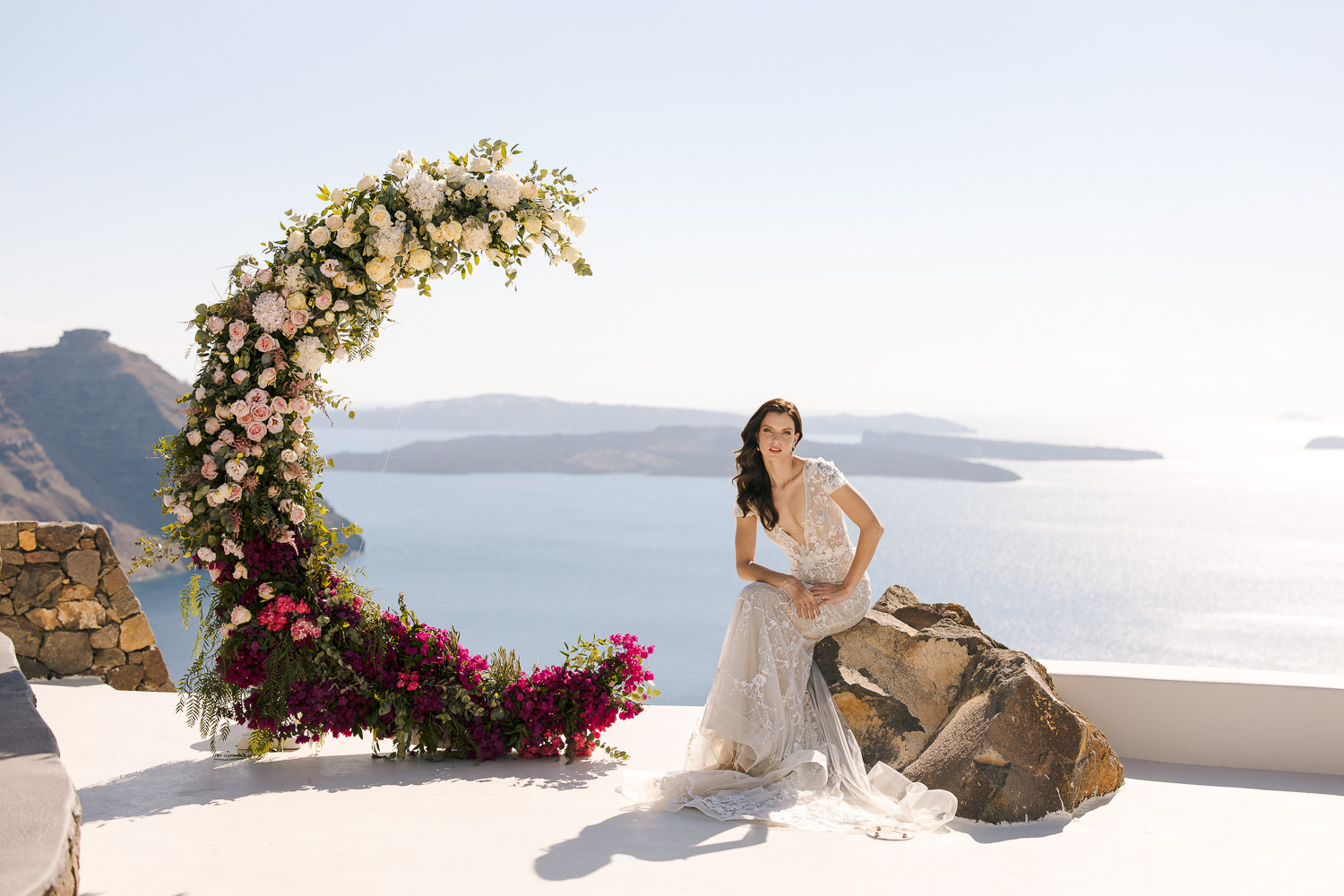 Aenaon villas Santorini wedding moon ceremony backdrop